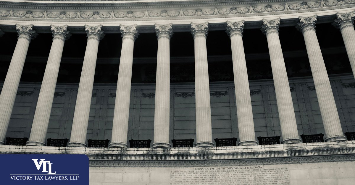 Government building columns, representing the separate California and federal tax agencies