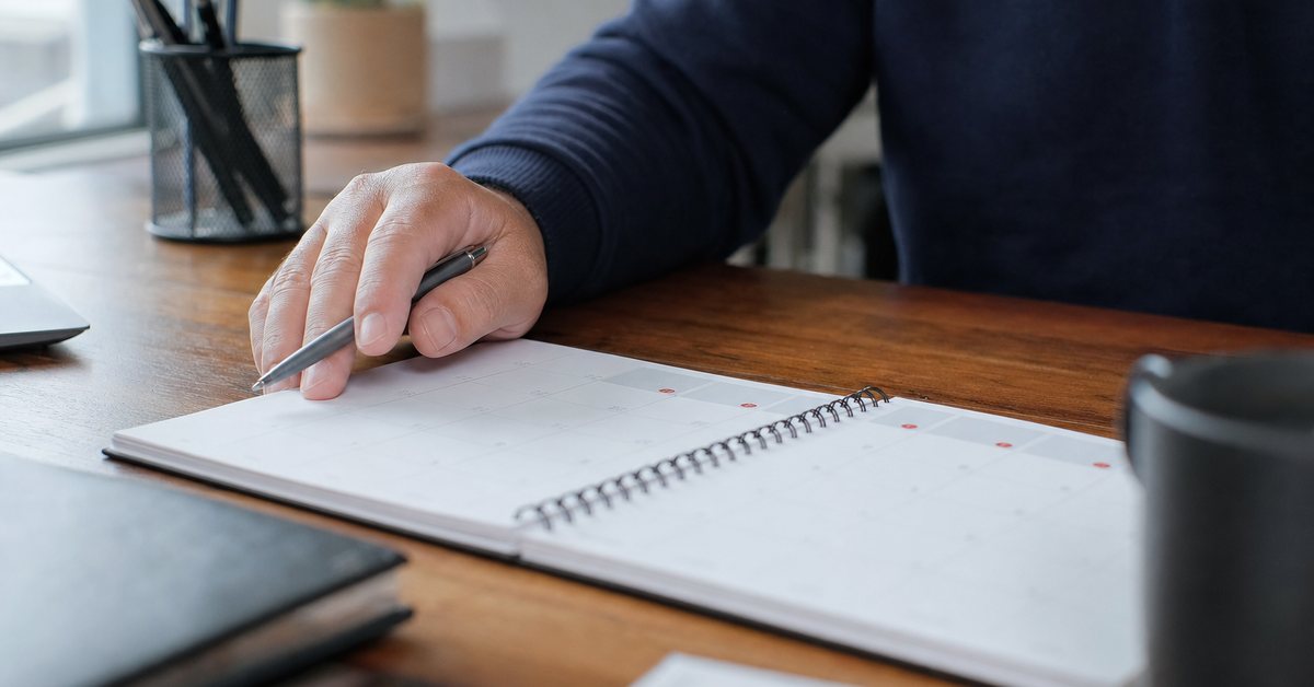 A hand marking dates on a desk planner tracking the weeks after a missed deadline, Victory Tax Lawyers