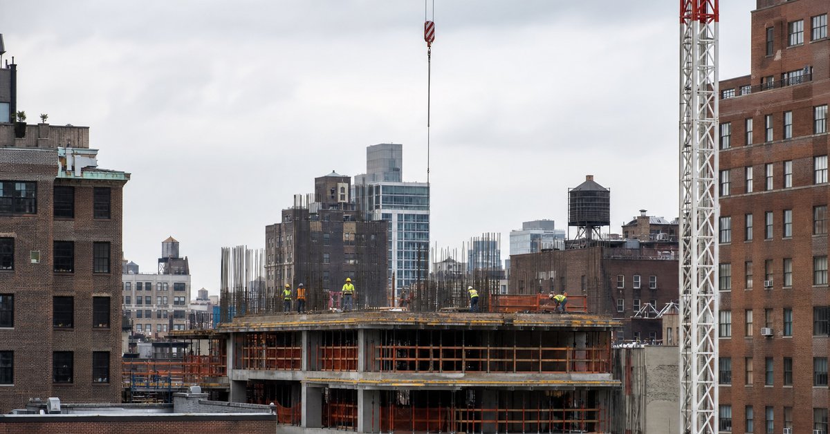 Construction crew on a New York City building site, an industry where the Fair Play Act presumes workers are employees